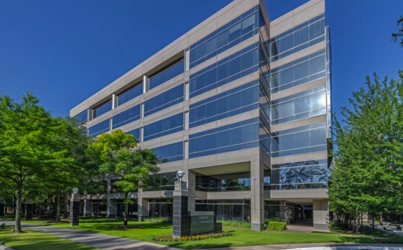 "Woodlands Office Building Acquired by Hughes Holdings: A Strategic Investment"